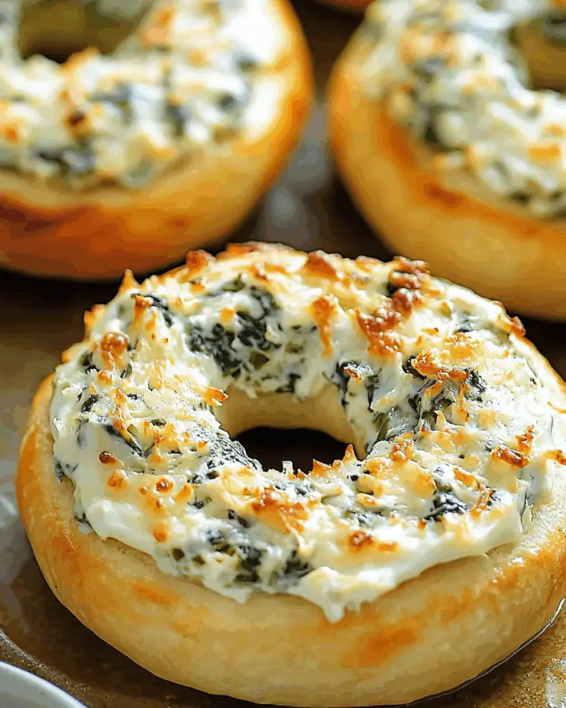 Cheesy Spinach Artichoke Bagels