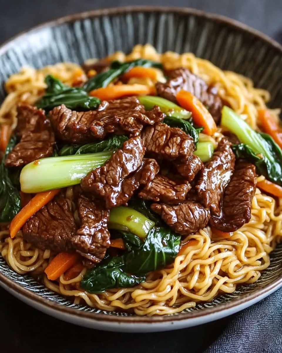 Crispy Beef Stir-Fry with Bok Choy over Pan-Fried Noodles