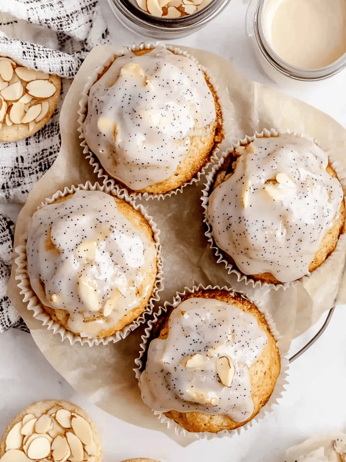 Glazed Almond Poppy Seed Muffins Topped With Poppyseed Glaze